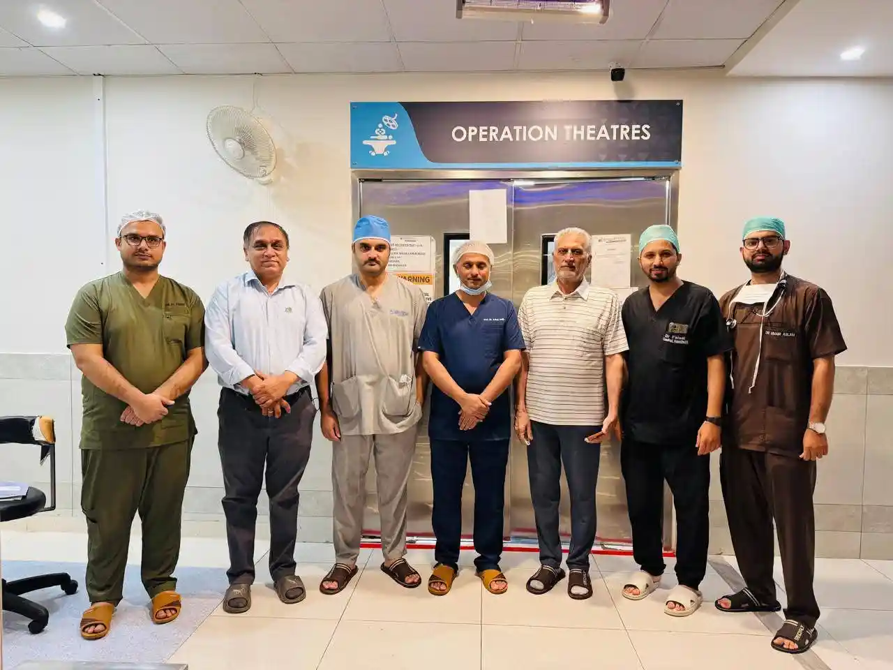 Prof. Dr. Muhammad Irshad Malik with his ENT team at the Jinnah Hospital operating theatre